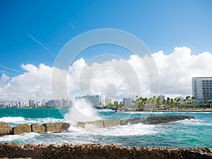 The Atlantic Ocean and waves on a beautiful hot, sunny and windy day. San Juan, Puerto Rico