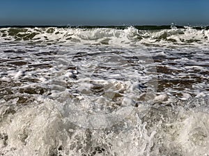 Atlantic Ocean waves breaking on the sand beach at Agadir, Morocco