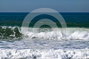 Atlantic Ocean waves breaking on the sea shore