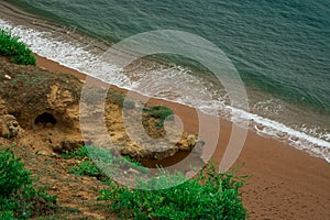 Atlantic Ocean waves come rolling in on a beach in England UK