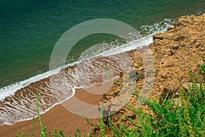 Atlantic Ocean waves come rolling in on a beach in England UK