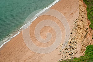 Atlantic Ocean waves come rolling in on a beach in England UK