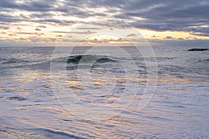 Atlantic Ocean waves crashing ashore onto the beach