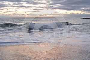 Atlantic Ocean waves crashing ashore onto the beach