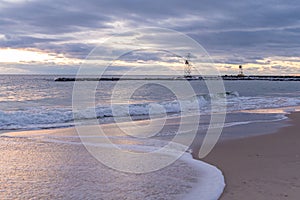 Atlantic Ocean waves crashing ashore onto the beach