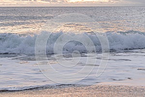 Atlantic Ocean waves crashing ashore onto the beach