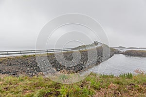 Atlantic road bridge in foggy weather, Atlantic seaside, Picturesque road between island number 64 from city Kristiansund in city