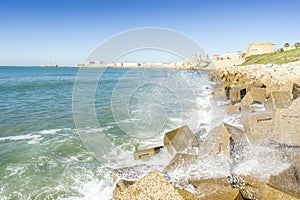 Atlantic waves crushing the waterbreaks in Cadiz, Andalusia, Spa