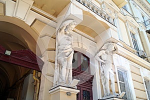 Atlases sculptures, decoration of residential building at Gogol Street, Odesa, Ukraine
