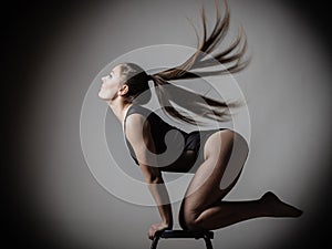 Atletic woman fit slim body posing