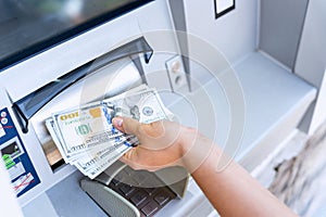 Atm machine money cash. Woman withdraw money bill. Holding american hundred dollar cash. Bank credit card and dollar