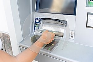 Atm money cash machine. Woman withdraw money bill. Holding american hundred dollar cash. Bank credit card, us dollar.