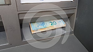 atm money euro 20 and 50 banknotes take withdraw