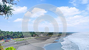The atmosphere of Batu Hiu beach, West Java Indonesia seen from the top of the hill during the day