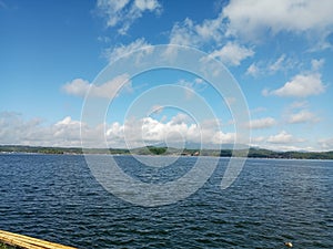 the atmosphere of the beauty of the dharma reservoir with its very blue water