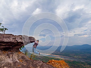 The atmosphere at Cha na dai Cliff and tourists on the rocks, Ubon Ratchathani Province.