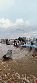 The atmosphere on the edge of the Musi river in the afternoon