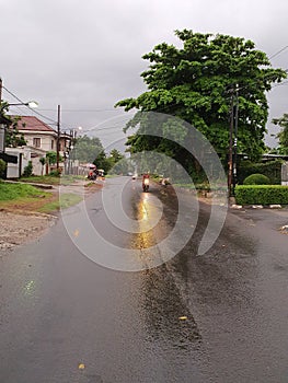 the atmosphere after the rain in the way of orchid cinere depok west java indonesia photo