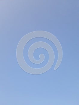 the atmosphere of the sky is blue and bright in the morning