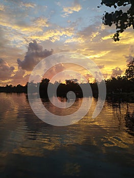 Reflected sunset water of lake