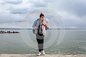 Atmospheric lifestyle photo woman with baby