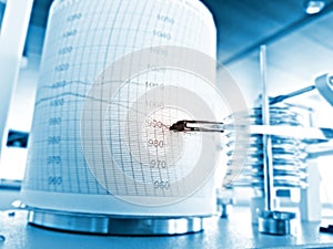 Atmospheric pressure graph, barograph. Pressure going down, dropping.