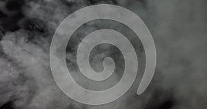 Atmospheric smoke 4K Fog effect. VFX Element. Haze background. Abstract smoke cloud. Smoke in slow motion on black