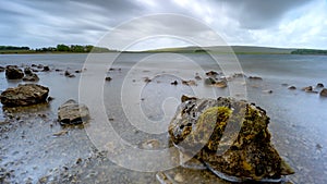 Atmospheric stormy skies over Mlaham Tarn, Yorkshire Dales National Park