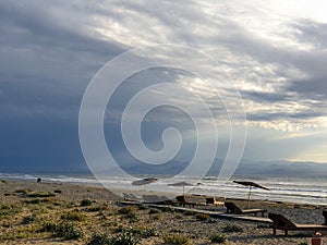 Atmospheric view of empty Ayia Eirini beach in Cyprus on a windy stormy day