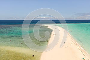 Atoll with an island of white sand.