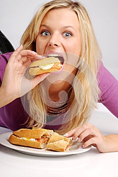 Atractive blonde woman with baguette