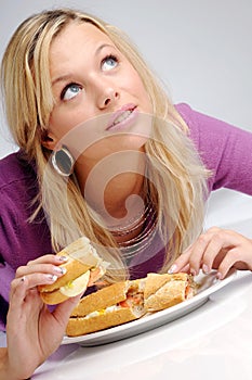 Atractive blonde woman with baguette