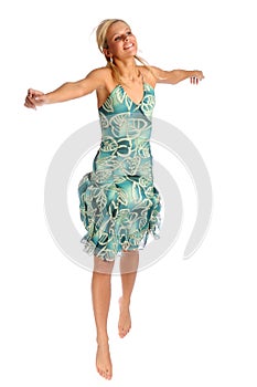 Atractive blonde woman in blue patterned dress