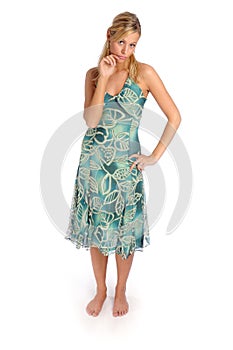 Atractive blonde woman in blue patterned dress