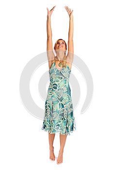 Atractive blonde woman in blue patterned dress