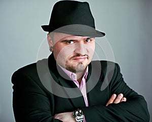 Atrractive man in black hat