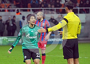 Atsuto Uchida reacts during UEFA Champions League game