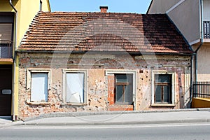 Attached house damaged by shrapnels during war