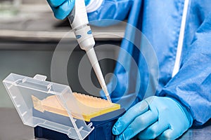 Attaching a disposable tip to a micropipette