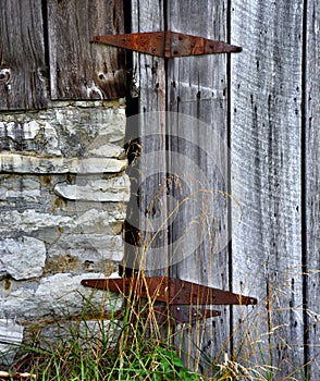 Attaching Door to Both Wood and Stone