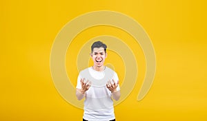 Attactive young asian man fury and angry negative emotion wearing white t-shirt