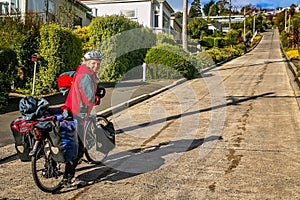 Attempting to cycle up the Baldwin Street photo