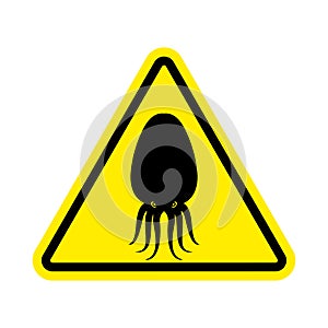 Attention cuttlefish. Octopus on yellow triangle. Road sign Caution devilfish