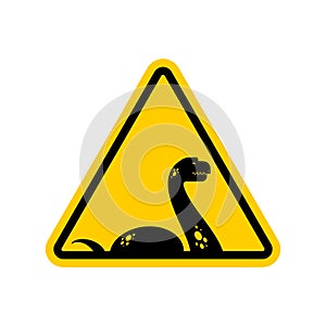 Attention Loch Ness monster. Caution Nessie. Yellow triangle road sign photo