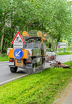 Attention mowing roadside