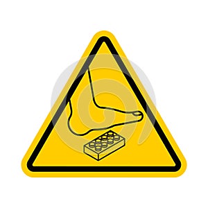 Attention Plastic construction Detail. Warning yellow road sign. Step onto the Constructor. Caution Forbidding Detail Plastic