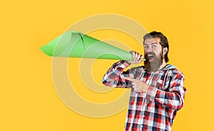 attention please. male speak in megaphone. hipster checkered shirt for bearded guy with loudspeaker. unshaven brutal man