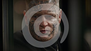 Attention-seeking Tattooed Male Person Standing on Urban City Street