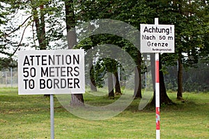 Attention sign posted at Checkpoint Alpha in East Germany photo