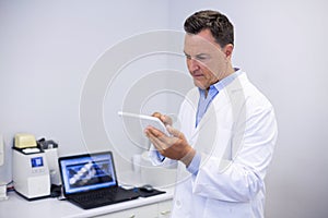 Attentive dentist using digital tablet